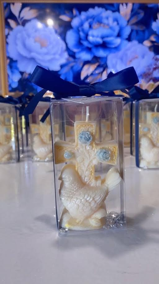 Cross candle with a dove of peace in clear box with navy ribbon