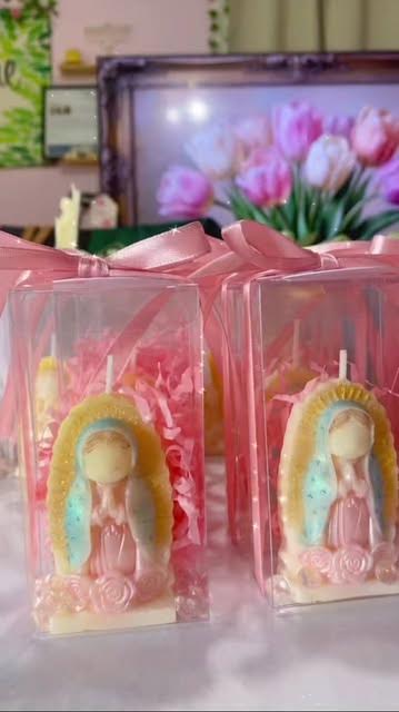 Hand-painted Virgin of Guadalupe candle favors in clear boxes with ribbons