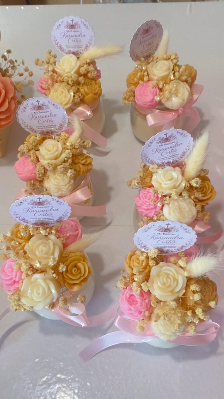 Group of 8 oz bouquet candles arranged with personalized tags