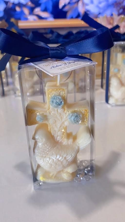 Cross candle with a dove of peace in clear box with navy ribbon