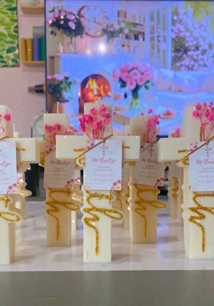 Faith Candle keepsakes with pink dried flowers, gold script detail and personalized event tags