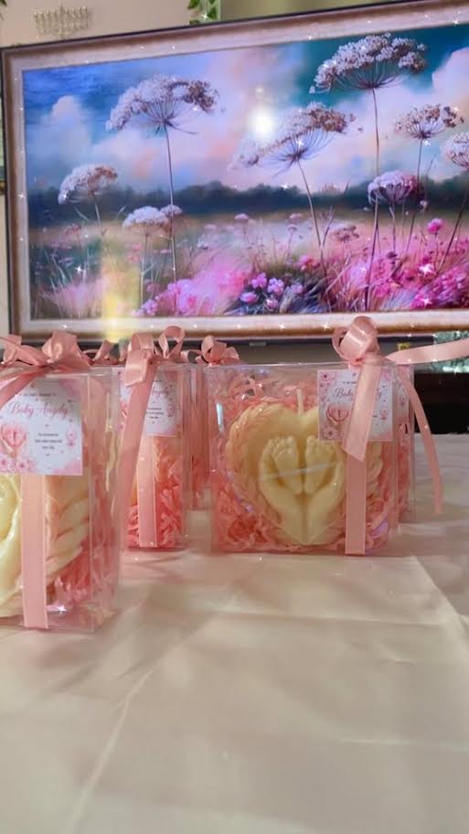 Heart-shaped baby feet candle favors with personalized baby shower cards