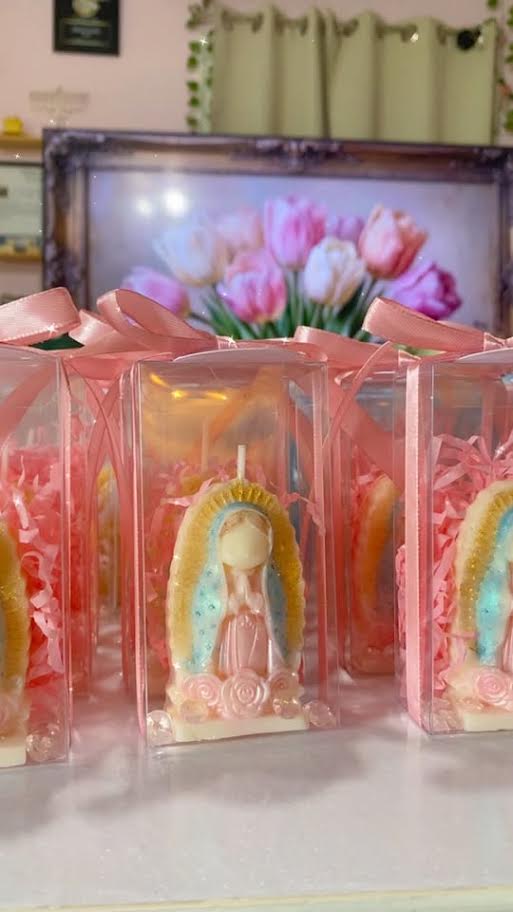 Hand-painted Virgin of Guadalupe candle favors in clear boxes with ribbons