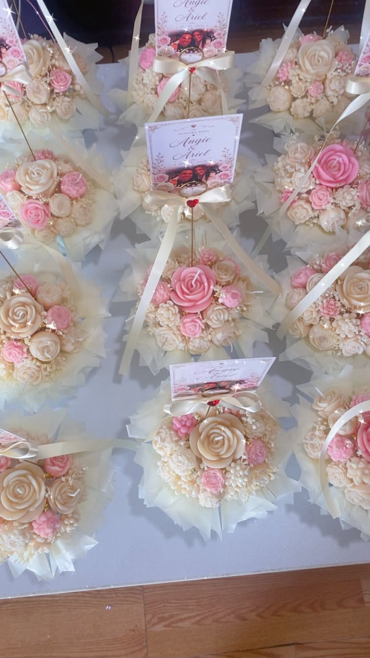 Overhead view of all the wedding florivela bouquets with wax roses